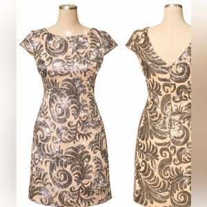 Adrianna Papell Sequin scrolling, mini dress.  Cap sleeves, form fit. Fit like 4